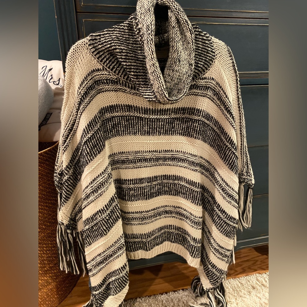 Wool fringe poncho sweater